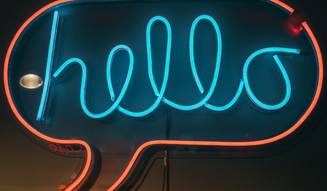 Image of a neon sign that reads: Hello