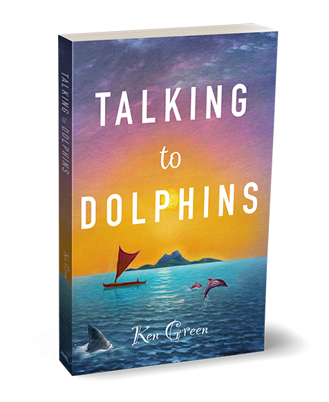 Image of Ken Green's book, Talking with Dolphins. There is white lettering for the title, covering 3/4 of the book over a backdrop of a deep orange sunset and bright blue ocean with a dolphin diving